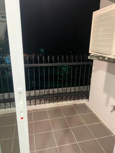 a room with a balcony with a view at Courtyard Khaoyai Condo in Mu Si