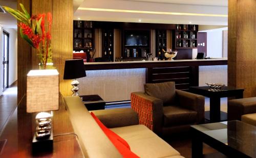 Majoituspaikan Hotel Royal Kinshasa baari tai lounge-tila