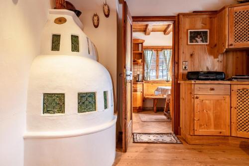 a room with a large white object on the wall at Ferienwohnung Manuelas Hofschank in Auna di Sopra