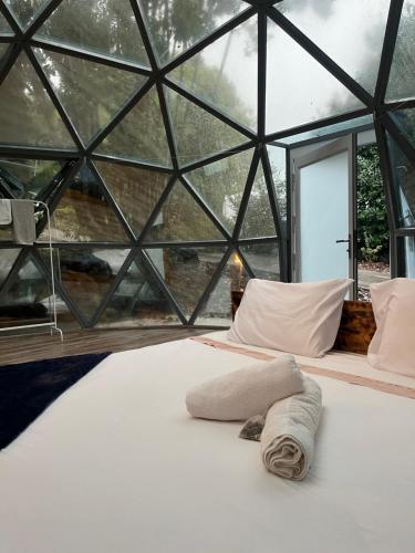 Postel nebo postele na pokoji v ubytování Quinta do Abacate - Glamping Park