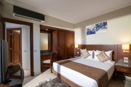Postel nebo postele na pokoji v ubytování Sultan Gardens Resort Sharm El Sheikh - Ultra All Inclusive
