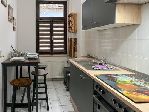 Kuchyň nebo kuchyňský kout v ubytování FederTraum mit Sauna sehr gemütlich, NEU