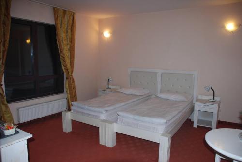 Postel nebo postele na pokoji v ubytování Guest House ANEX