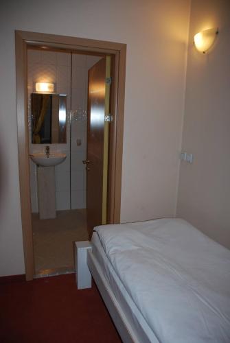 Postel nebo postele na pokoji v ubytování Guest House ANEX