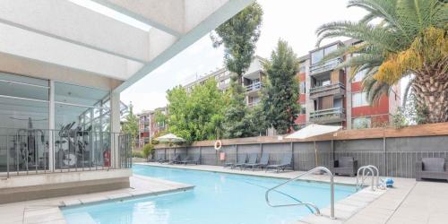 Swimmingpoolen hos eller tæt på Hermoso y acogedor Apartamento