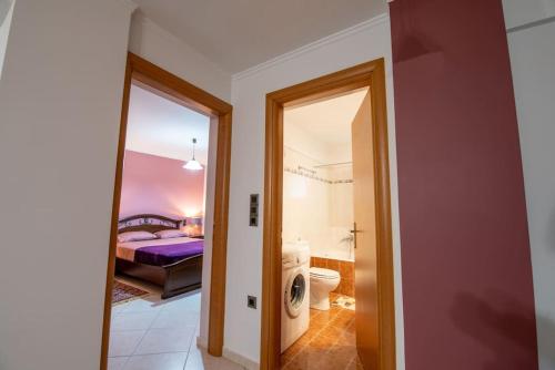 Ένα ή περισσότερα κρεβάτια σε δωμάτιο στο Alexandros Apartments 2