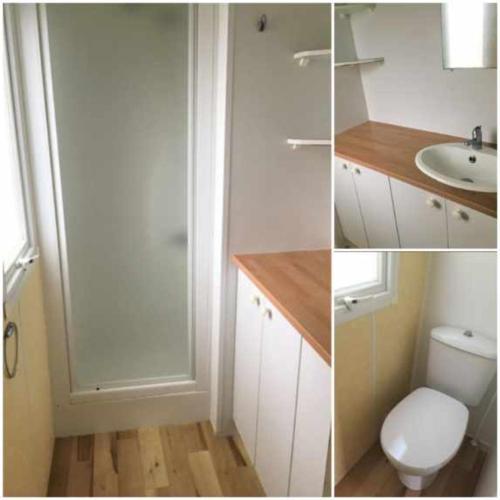 une salle de bain blanche avec des toilettes et un lavabo dans l'établissement Cosy Lili - Mobilhome RESPIRO - Pleine nature, plage à 250mn, à Damgan
