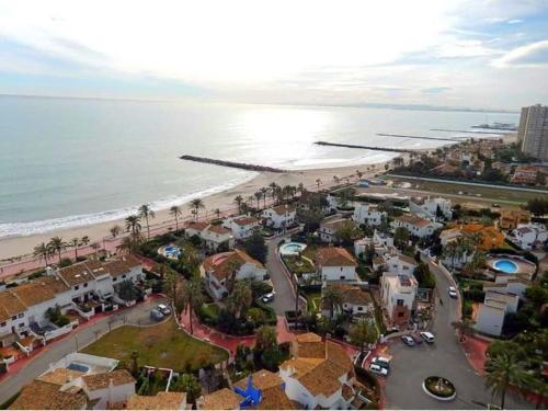 an aerial view of a city and the beach at APARTAMENTO PLAYA URB PRIVADA 2 Habitaciones in Valencia