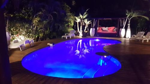 Bazén v ubytování Villa CINTA piscine chauffée 100 m du lagon nebo v jeho okolí