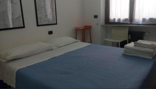 Postel nebo postele na pokoji v ubytování B&B Al Molo