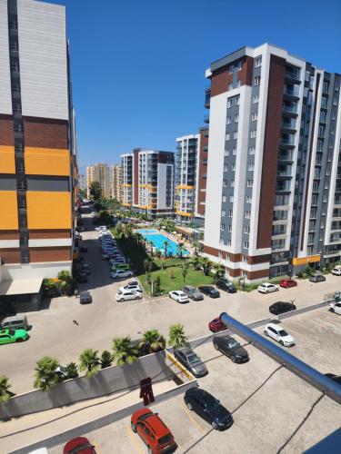 an aerial view of a parking lot in a city at Luxury Apartment POOL SPA GYM 1+1 in Antalya