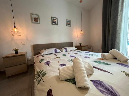Ένα ή περισσότερα κρεβάτια σε δωμάτιο στο Cozy apartment Gzira or Sliema Race1