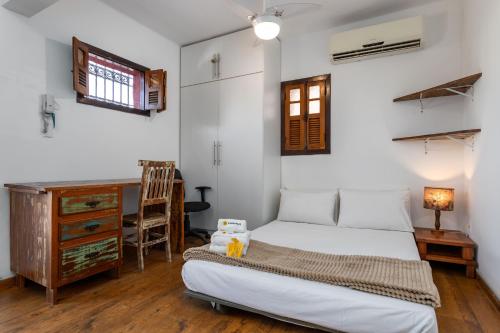 En eller flere senge i et værelse på Belo em Santa Teresa - Bairro histórico - JM201 Z5