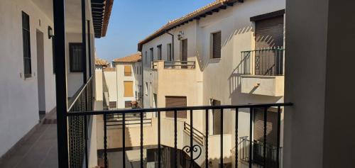 a view from a balcony of a building at Balcon del Calar 27, Guejar Sierra in Güéjar-Sierra