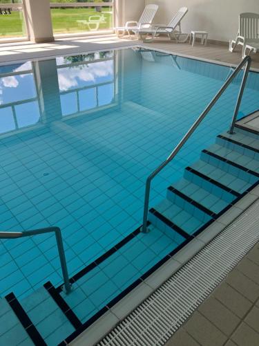 Kolam renang di atau dekat dengan Magnifique Appartement Cosy