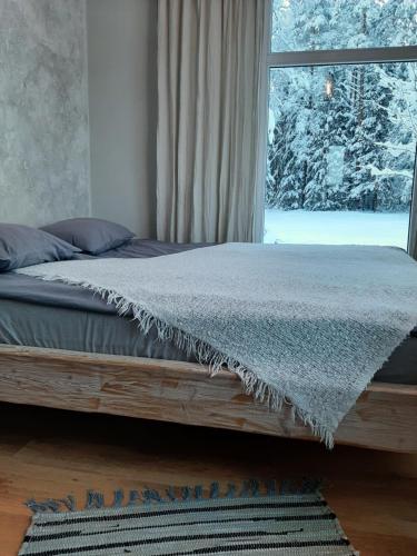 Postel nebo postele na pokoji v ubytování Mellene 1 bedroom house in nature & hot tube