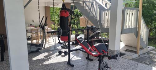 a room with a gym with a swing at Home Away Comfort stay in Suva