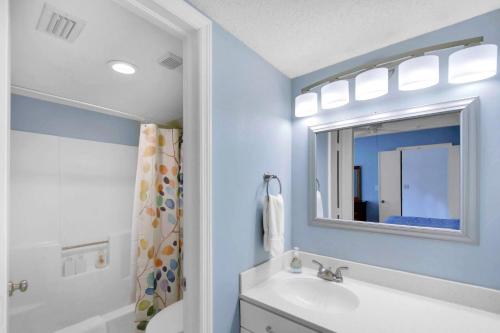 a bathroom with a sink and a mirror at Harbour Oaks 311 in Saint Simons Island
