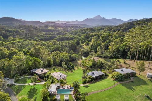 an aerial view of a home in the mountains at La Rochér Eco Retreat in Stokers Siding