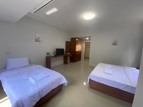 Cama o camas de una habitación en ศิวพฤกษ์ เพลส