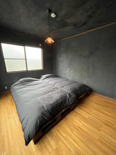 En eller flere senge i et værelse på Machigoto Hotel LOOP-Akamatsu Street - Vacation STAY 94005v