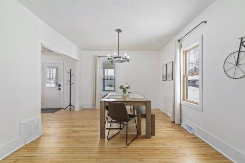 a dining room with a table and a chair at Remodeled* Sleeps 7, Fire Pit, Indoor Bike Storage in Crosby