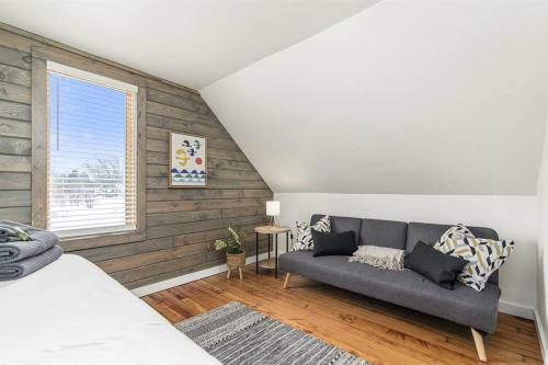 a living room with a couch and a window at Remodeled* Sleeps 7, Fire Pit, Indoor Bike Storage in Crosby