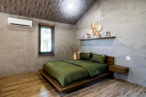Ένα ή περισσότερα κρεβάτια σε δωμάτιο στο Eco House Villa