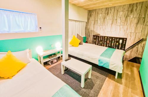 En eller flere senge i et værelse på USJ 2 stops, Umeda&Dotonbori 8mins, TiffanyBlue theme SV3