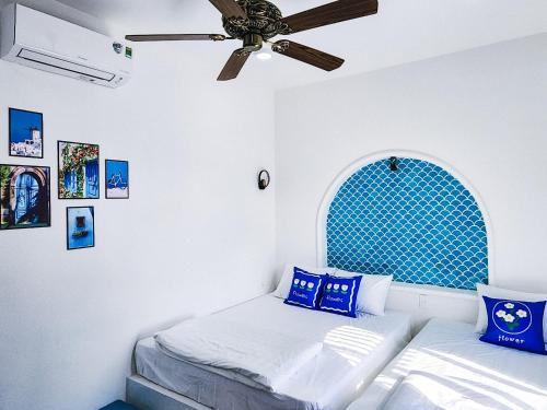 Giường trong phòng chung tại Dragon Sea Homestay