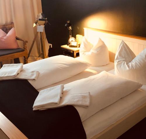 Postel nebo postele na pokoji v ubytování beans parc hotel jade