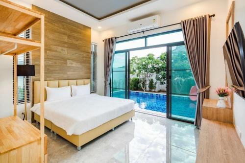 Ban Bo Fai (1)にあるVilla Me&you4のベッドルーム1室(ベッド1台、プール付)