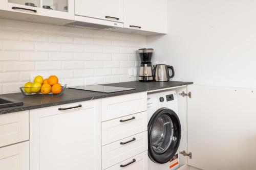 Η κουζίνα ή μικρή κουζίνα στο Sunny Coast Studio with SPA in Pobierowo by Noclegi Renters