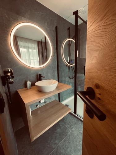 Ein Badezimmer in der Unterkunft Bierhotel Loncium & Privatbrauerei