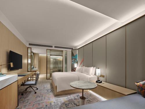 Doubletree By Hilton Nanning Wuxiangにあるテレビまたはエンターテインメントセンター