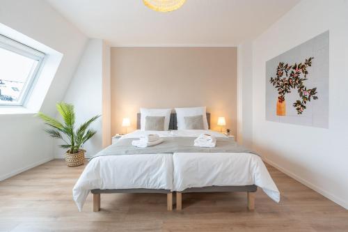 Ένα ή περισσότερα κρεβάτια σε δωμάτιο στο BENVILLE Freital - Nespresso Kaffee - Windbergblick - Zentral