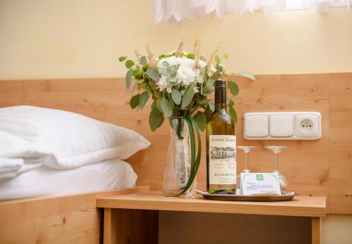 Postel nebo postele na pokoji v ubytování Horský Hotel Skiland