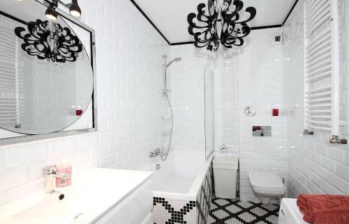Ванна кімната в APRTAMENT PARK CENTRALNY