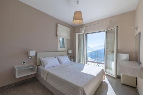 Ένα ή περισσότερα κρεβάτια σε δωμάτιο στο Olive Grove Villa