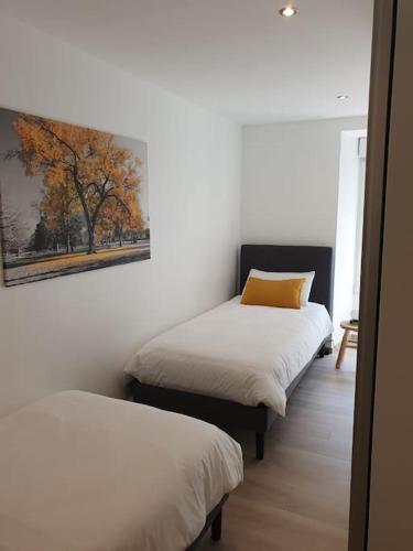 Postel nebo postele na pokoji v ubytování Gîte Manoir de Kerlez Plain-pied