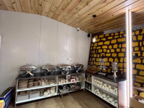 a kitchen with aasteryasteryasteryasteryasteryasteryasteryasteryasteryasteryasteryastery at NIVEDAN HOTEL AND RESORT in Nainital