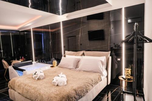 Postel nebo postele na pokoji v ubytování Superior Suite Palermo