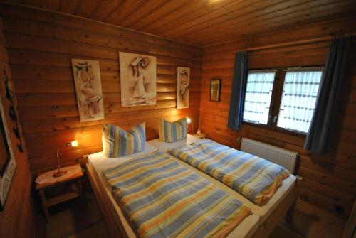 Postel nebo postele na pokoji v ubytování Ferienhaus Buddelschiff