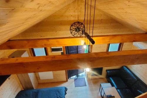 an overhead view of a loft in a log cabin at Tiny Treperka in Semily