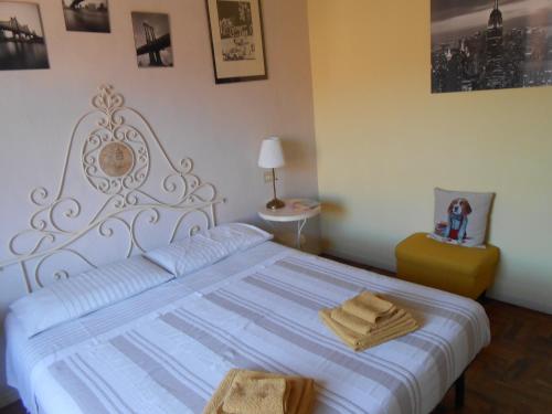 Postel nebo postele na pokoji v ubytování suite tra i tetti con bagno privato