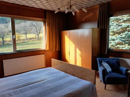 Ένα ή περισσότερα κρεβάτια σε δωμάτιο στο Apartment am Waldrand mit Fernblick