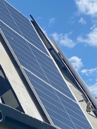 a solar panel on the roof of a house at La Lechere Guest House in Phalaborwa