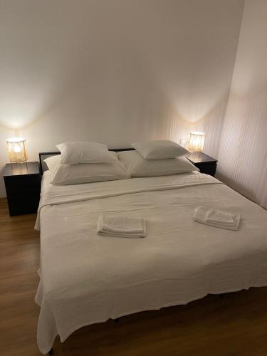 Postel nebo postele na pokoji v ubytování Apartment Hilde