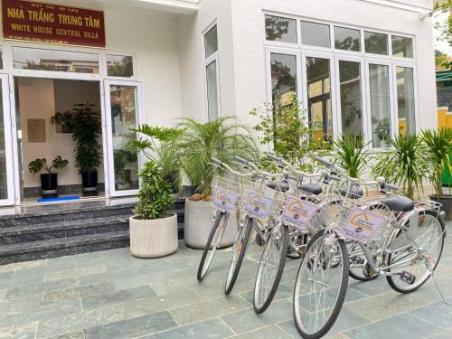 a row of bikes parked in front of a store at White House Central Villa in Hoi An