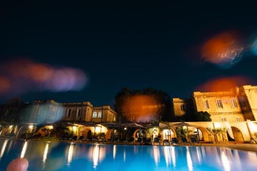 a view of a city at night at SC Club Village in Pembroke 